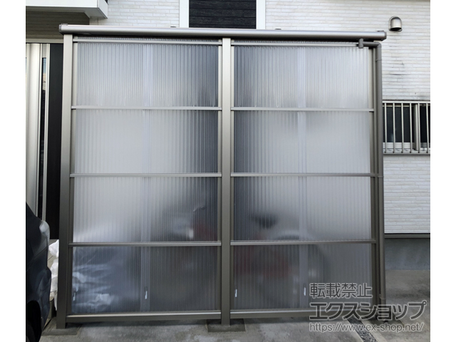 栃木県宇都宮市のLIXIL リクシル（トステム）のカーポート スピーネストックヤードF型 波板タイプ スクリーン仕様 積雪〜20cm対応 施工例