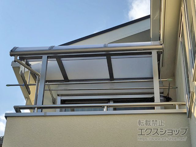 大阪府枚方市のLIXIL リクシル（トステム）のバルコニー・ベランダ屋根 パワーアルファ RB型 屋根タイプ 単体 積雪〜30cm対応 施工例