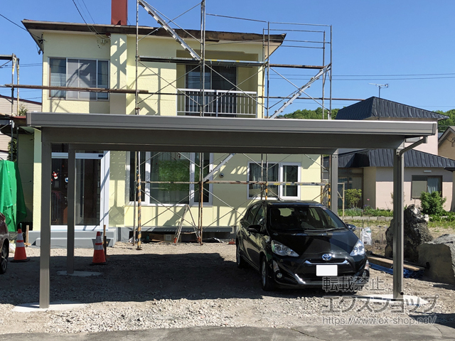 北海道苫小牧市のLIXIL リクシル（トステム）のカーポート テリオスポートIII 1500 2台用 角柱4本柱 積雪〜50cm対応 施工例
