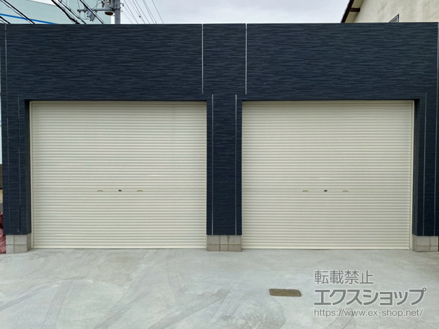 大阪府泉佐野市のLIXIL リクシル（トステム）のガレージシャッター 【特注】ガレージシャッタークワトロ 手動式 内部付タイプ 施工例