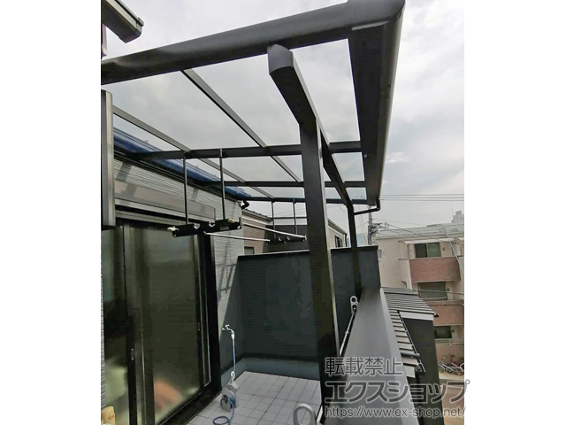 大阪府大阪市のLIXIL リクシル（トステム）のバルコニー・ベランダ屋根 パワーアルファ F型 屋根タイプ 単体 積雪〜30cm対応 施工例