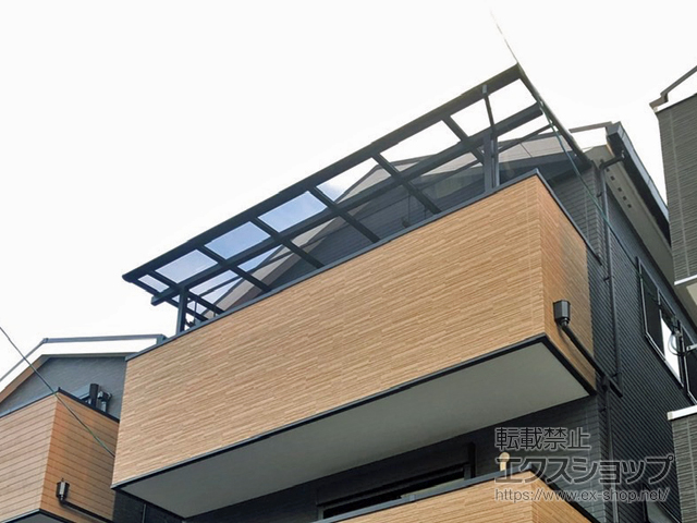 大阪府豊中市のLIXIL リクシル（トステム）のバルコニー・ベランダ屋根 パワーアルファ F型 屋根タイプ 単体 積雪〜30cm対応 施工例