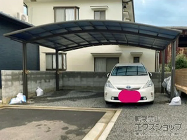 愛媛県松山市のLIXIL(リクシル)のカーポート ネスカR (ラウンドスタイル) ワイド 積雪～20cm対応 施工例