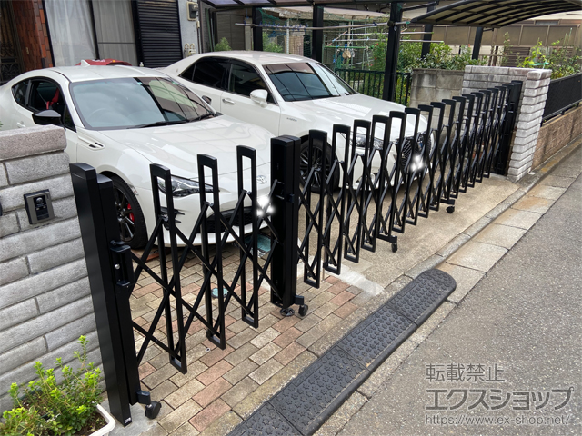 埼玉県ふじみ野市ののカーゲート トリップゲートII 2型 スタンダード ノンレール 片開き親子57ＤＯ 12Ｓ＋45Ｔ 施工例