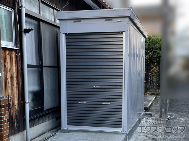 長崎県松浦市のの倉庫・ガレージ イク保管庫 一般型 床付タイプ 1370×2630×2375 ハイルーフ FXN-1326HY 施工例