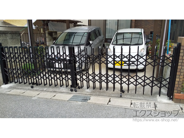 千葉県松戸市ののカーゲート トリップゲートII S型 傾斜地対応 ノンレール 両開き　52W(26S+26M) 施工例