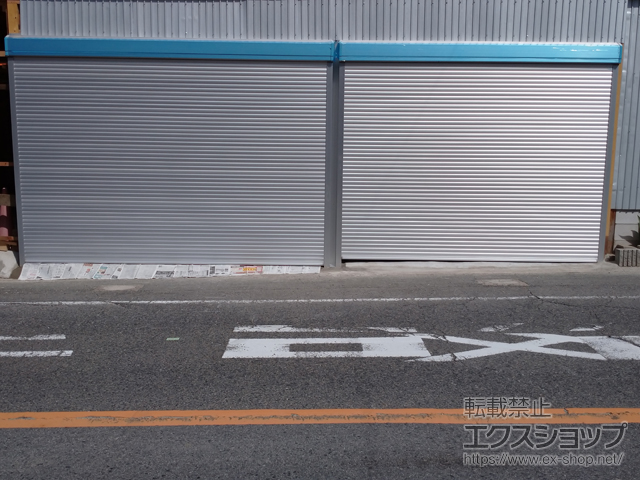 奈良県北葛城郡王寺町のLIXIL リクシル（トステム）のガレージシャッター ガレージシャッタークワトロ 電動式 外部付タイプ 施工例