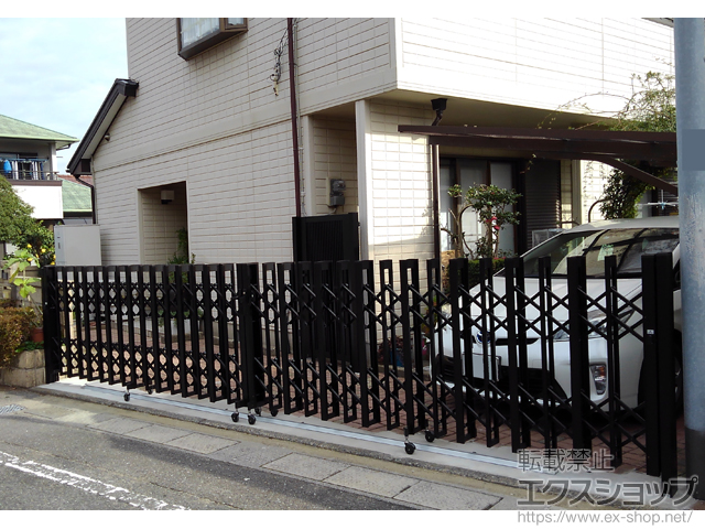 福岡県春日市ののカーゲート アルシャインII HW型Aタイプ センターレール 両開き　630W 施工例