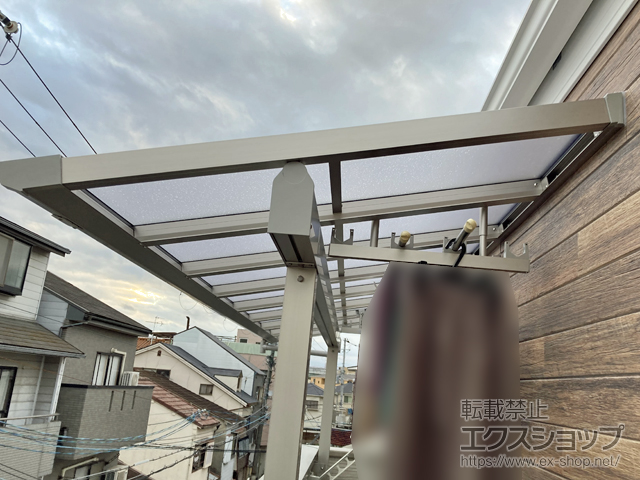 大阪府大阪市ののバルコニー・ベランダ屋根 プレシオステラスII F型 1500 屋根タイプ 単体 積雪〜50cm対応 施工例