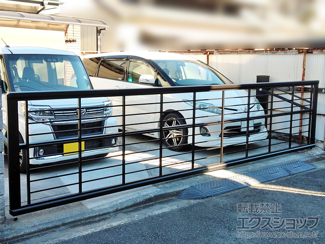 神奈川県横浜市ののカーゲート ルシアスアップゲートワイド 1型 横格子 電動 施工例