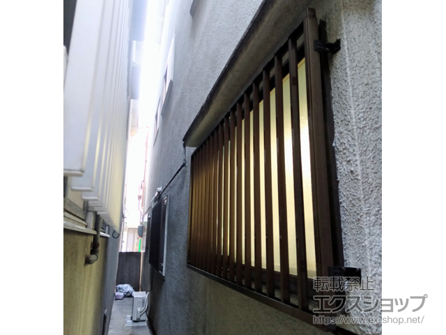 大阪府大阪市のLIXIL リクシル（トステム）の面格子・窓格子 【特注】アルミ面格子 たて格子 施工例