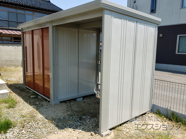 石川県河北郡津幡町のの物置・屋外倉庫 Mr.ストックマン プラスアルファ 多雪型 4047×1590×2110（扉側幅2200） TP-S40R15-T 施工例