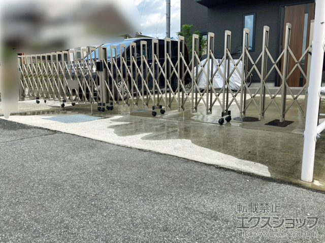 奈良県香芝市ののカーゲート トリップゲートII 2型 スタンダード ノンレール 両開き　74W(37S+37M) 施工例