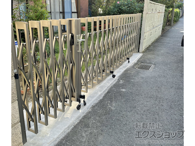 東京都調布市ののカーゲート アルシャインII M型 Aタイプ ノンレール 両開き親子　(150+390)WP 施工例