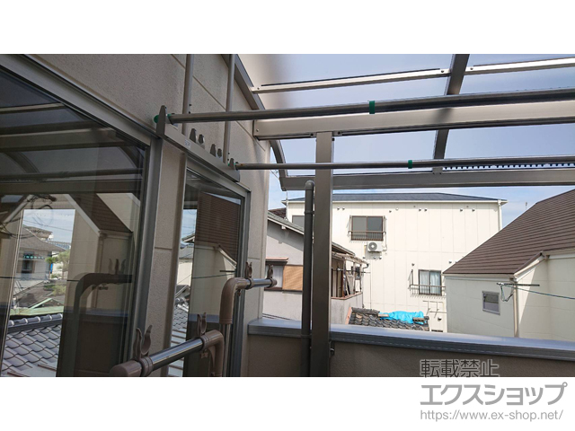 兵庫県西宮市ののバルコニー・ベランダ屋根 プレシオステラスII R型 屋根タイプ 単体 積雪〜20cm対応＋吊り下げ式固定物干し 標準タイプ 施工例