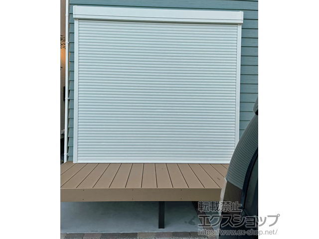 愛知県岡崎市のLIXIL リクシル（トステム）のガレージシャッター ガレージシャッタークワトロ 電動式 外部付タイプ 施工例