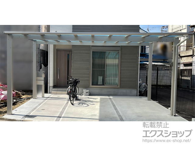 大阪府堺市ののカーポート エフルージュ ツイン FIRST 積雪〜20cm対応＜前枠斜め切詰納まり＞＋水平式物干し 2本入り 施工例