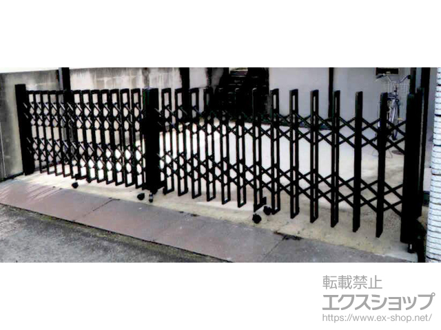 大阪府河内長野市ののカーゲート トリップゲートII S型 傾斜地対応 ノンレール 両開き　56W（28S+28M） 施工例