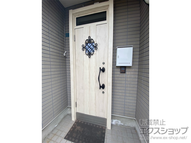 北海道札幌市のLIXIL リクシル（トステム）の玄関ドア リシェント玄関ドア3 断熱K2仕様 片開き仕様(ランマ付)外観左吊元 D77型 ※手動仕様 施工例