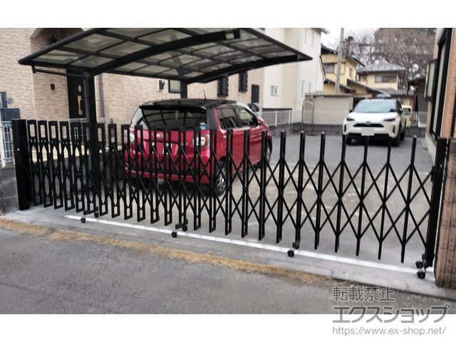 栃木県小山市ののカーゲート アルシャインII M型 Aタイプ センターレール 片開き 550S 施工例