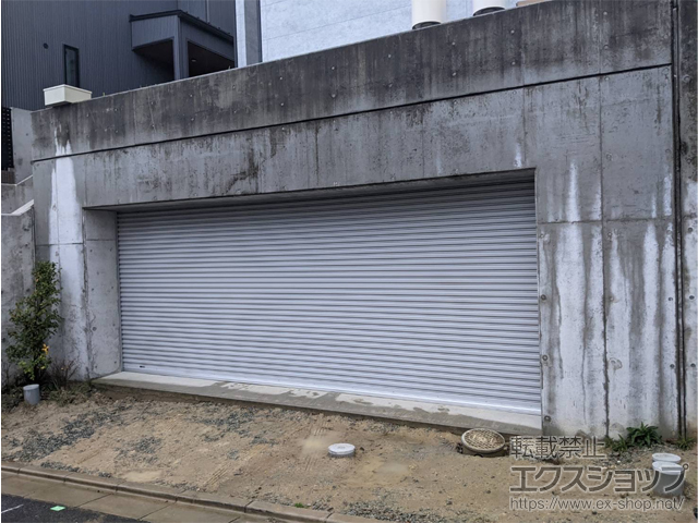 大阪府吹田市ののガレージシャッター プラテアII スチールタイプ 外置き 電動式 ※内部付 施工例