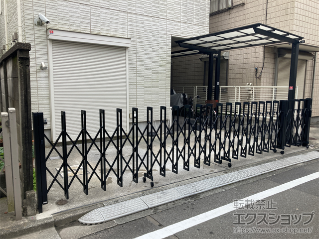 東京都板橋区ののカーゲート トリップゲートII 2型 スタンダード ノンレール 片開き親子　65DO(12S+53T) 施工例