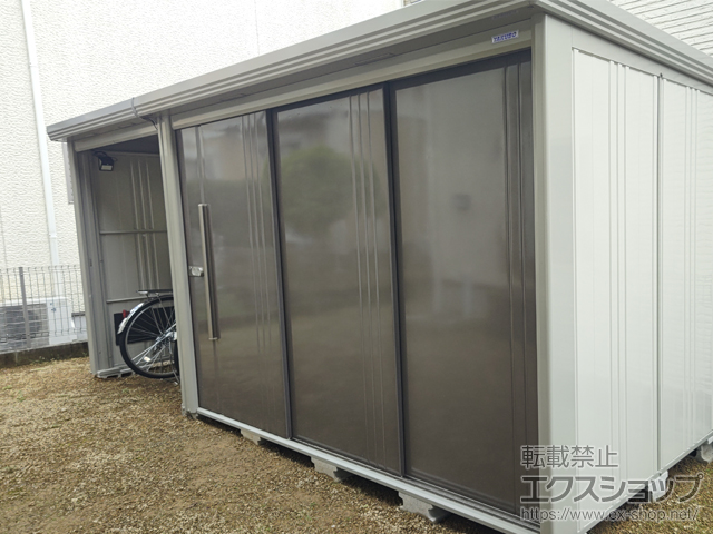 長崎県大村市のの物置・屋外倉庫 Mr.ストックマン プラスアルファ 多雪型 4047×1590×2110（扉側幅2532） TP-S4015-B 施工例