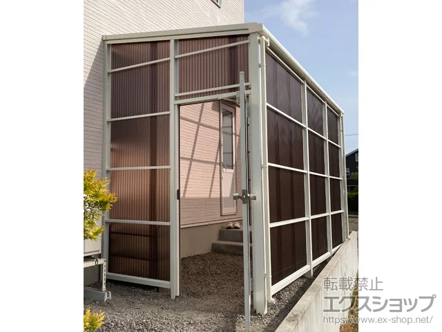 岩手県久慈市のLIXIL(リクシル)のストックヤード スピーネストックヤードF型 波板タイプ ヤード仕様 積雪50cm対応+ドアクローザー 施工例