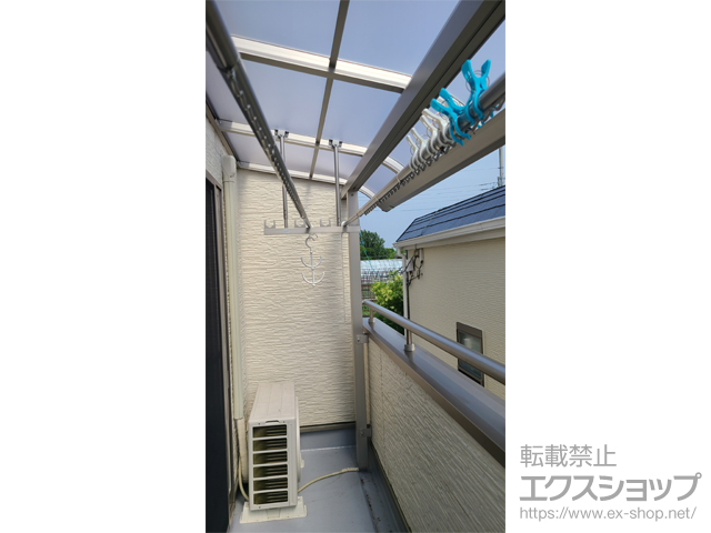 兵庫県西宮市ののバルコニー・ベランダ屋根、サイクルポート・駐輪場 プレシオステラスII R型 屋根タイプ 単体 積雪〜20cm対応＋吊り下げ式固定物干し 標準タイプ 長さ:標準 施工例