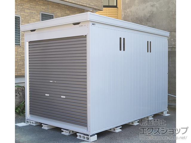 大阪府東大阪市のの倉庫・ガレージ バイク保管庫 一般型 床付タイプ 2210×3470×2385 ハイルーフ FM-2235HY+雨とい+シャッターケース+アルミスロープ+内施錠付引戸+採光壁+通気パネル+別売棚Dセット+フード付20 施工例