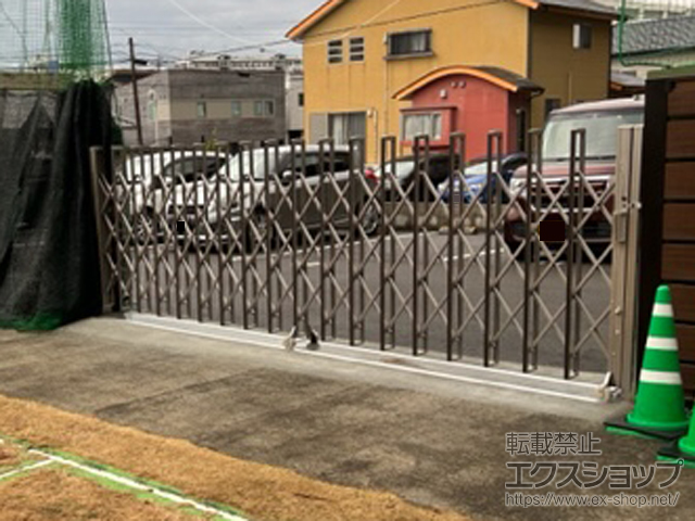 宮崎県延岡市ののカーゲート ニューハピネスHG レールタイプ 片開き 木調タイプ 460S 施工例