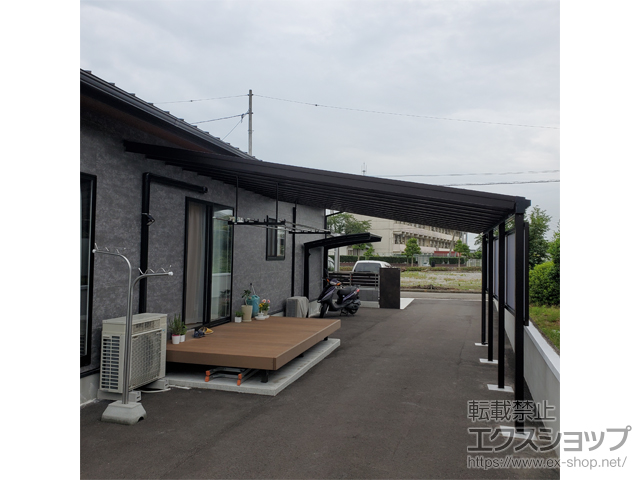 愛媛県新居浜市ののテラス屋根 ソラリア F型 ビッグサイズ 単体 積雪〜20cm対応＋吊り下げ式固定物干し＋前面パネル 施工例