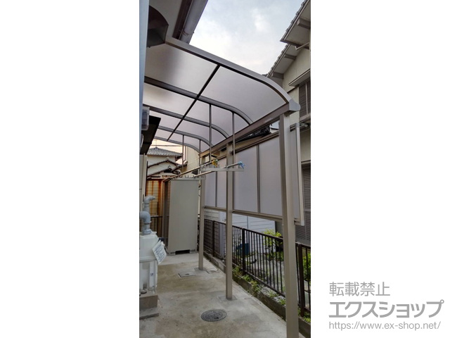 福岡県北九州市ののテラス屋根 プレシオステラスII R型 テラスタイプ 単体 積雪〜20cm対応+吊り下げ物干し+前面パネル 施工例