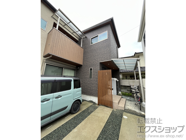 熊本県熊本市ののフェンス・柵 リレーリア フェンス2N型 木調色 間仕切柱施工 施工例