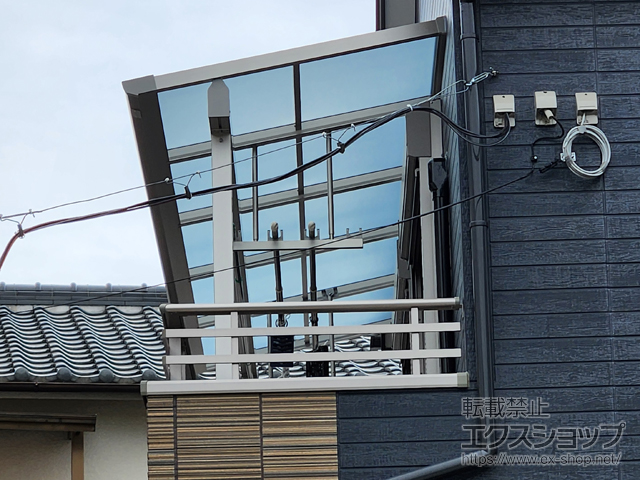 大阪府堺市ののバルコニー・ベランダ屋根 ソラリア F型 屋根タイプ 単体 積雪〜20cm対応＋吊り下げ式固定物干し 標準タイプ 施工例