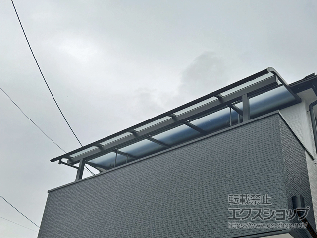 兵庫県尼崎市ののバルコニー・ベランダ屋根 ソラリア R型 屋根タイプ 単体 積雪〜20cm対応＋吊り下げ式固定物干し 施工例