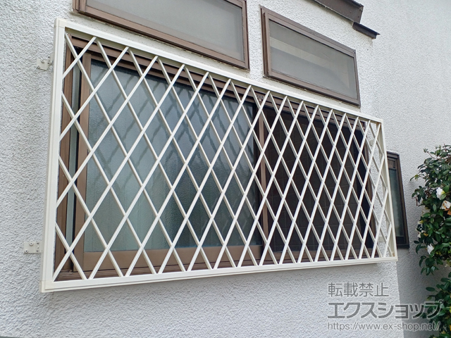 愛媛県松山市のLIXIL リクシル（トステム）の面格子・窓格子 【特注】アルミ面格子 ヒシクロス 施工例
