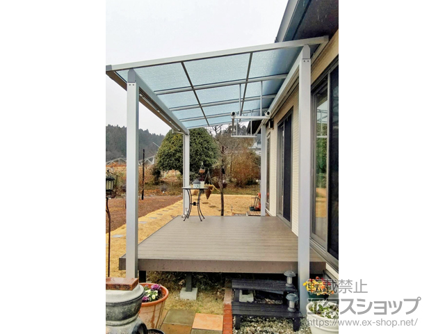 宮城県栗原市ののテラス屋根 ソラリア F型 独立タイプ 単体 〜20cm対応＋吊り下げ式固定物干し 標準タイプ（アルミ物干し竿あり） 施工例